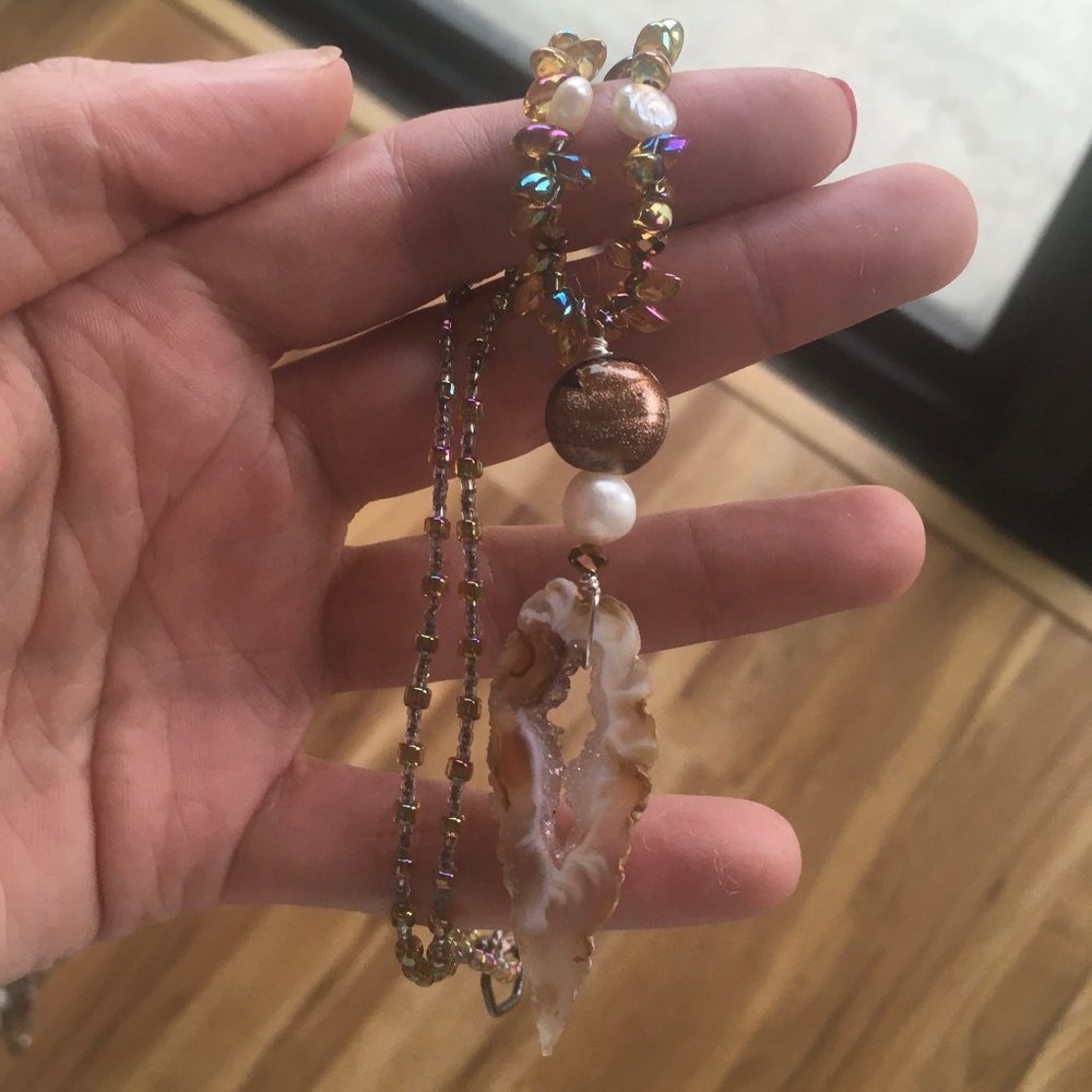 Gorgeous beaded necklace with carved pendant